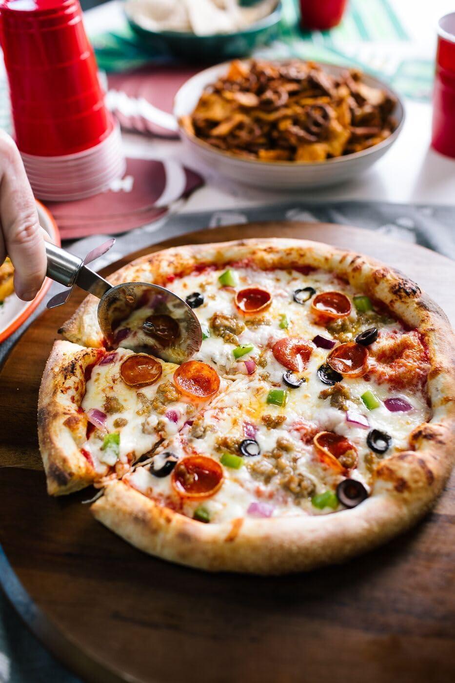 image:imageFrigidaire Electric Indoor Pizza Oven Reach Temperatures of 700F Stone Bake 12 Pizzas in Minutes Portable Countertop Oven with Air Fry and Bake Peel Included Model FRPO100BWith Pizza Peel Pizza Cutter