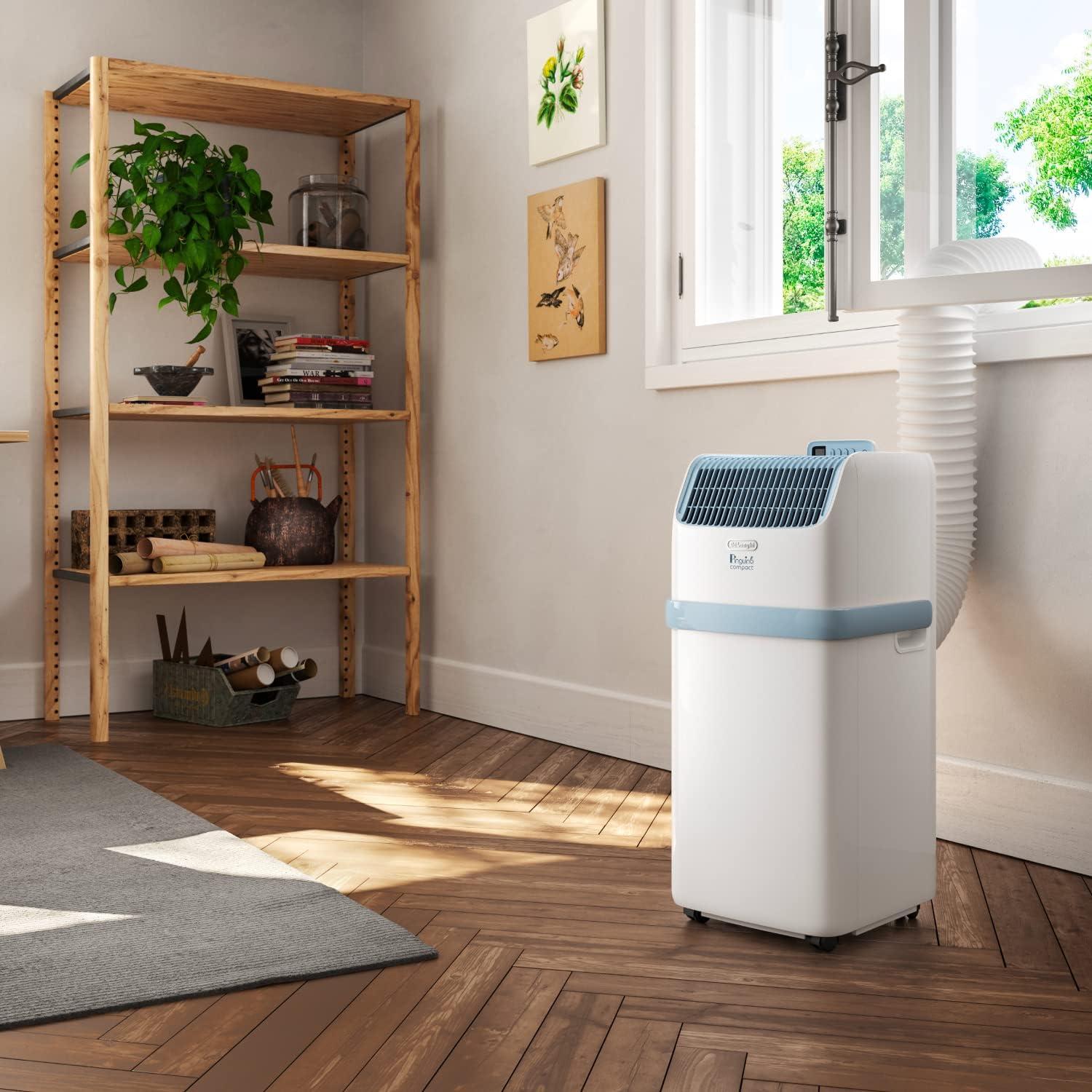 imageDeLonghi Pinguino Compact ES72 YOUNG Modle 2022 Climatiseur Mobile Silencieux 8300 BTUh 21 kW 60m3 Gaz R290 Fonction Dshumidificateur 24 Heures Timer Classe nergtique A Blanc