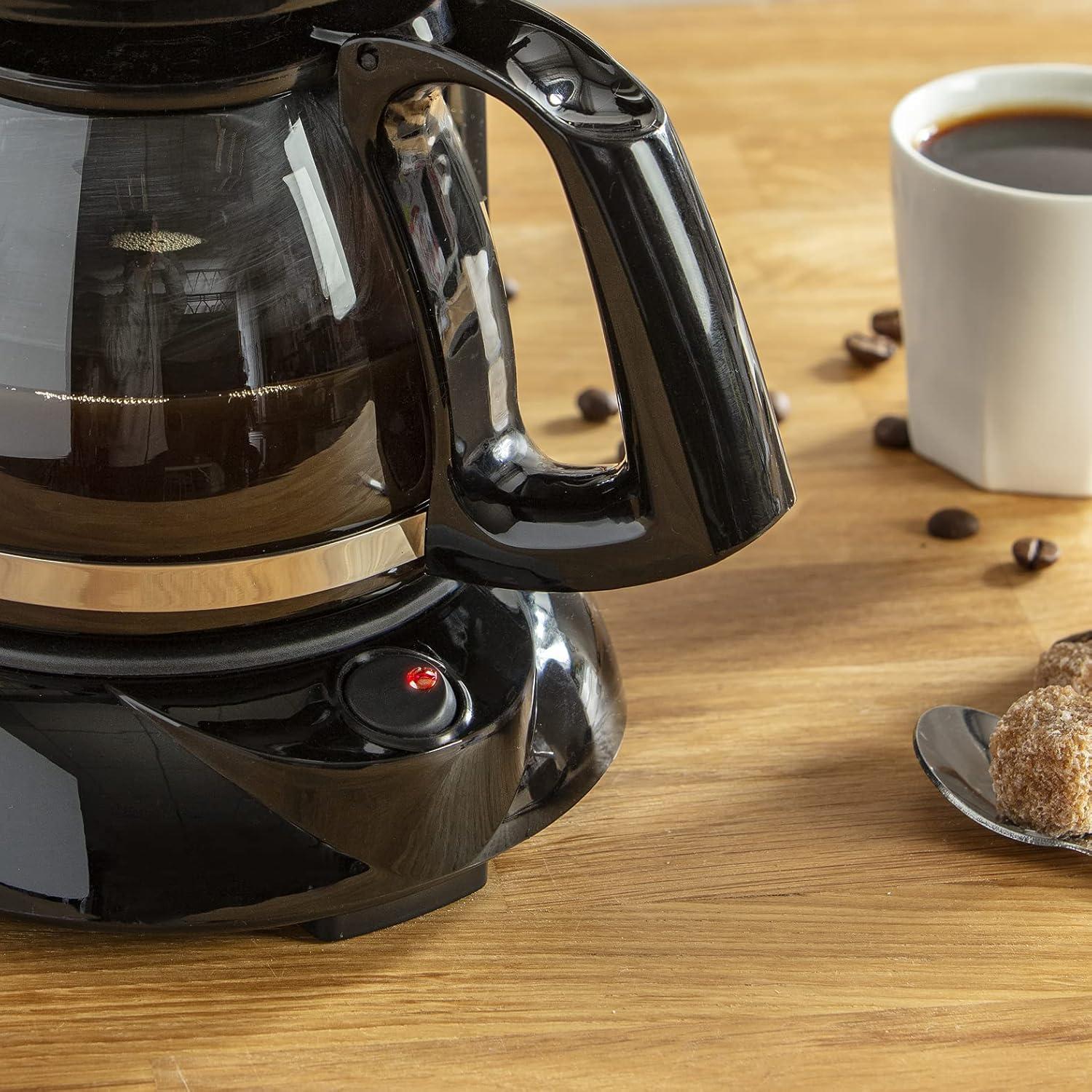 imageMoulinex Subito Cafetire filtre lectrique 06 L soit 6 tasses Machine caf Systme anti goutte Portefiltre pivotant Auto off 30 min FG150813 NoirInox