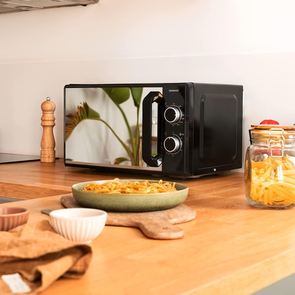 imageCecotec Microondes ProClean 3050 Capacit de 20 L Revtement Ready2Clean 700 W de Puissance 6 Niveaux de Fonctionnement Minuterie 30 minutes Mode Dcongeler Finition Noir et ArgentNoir avec Miroir Grill