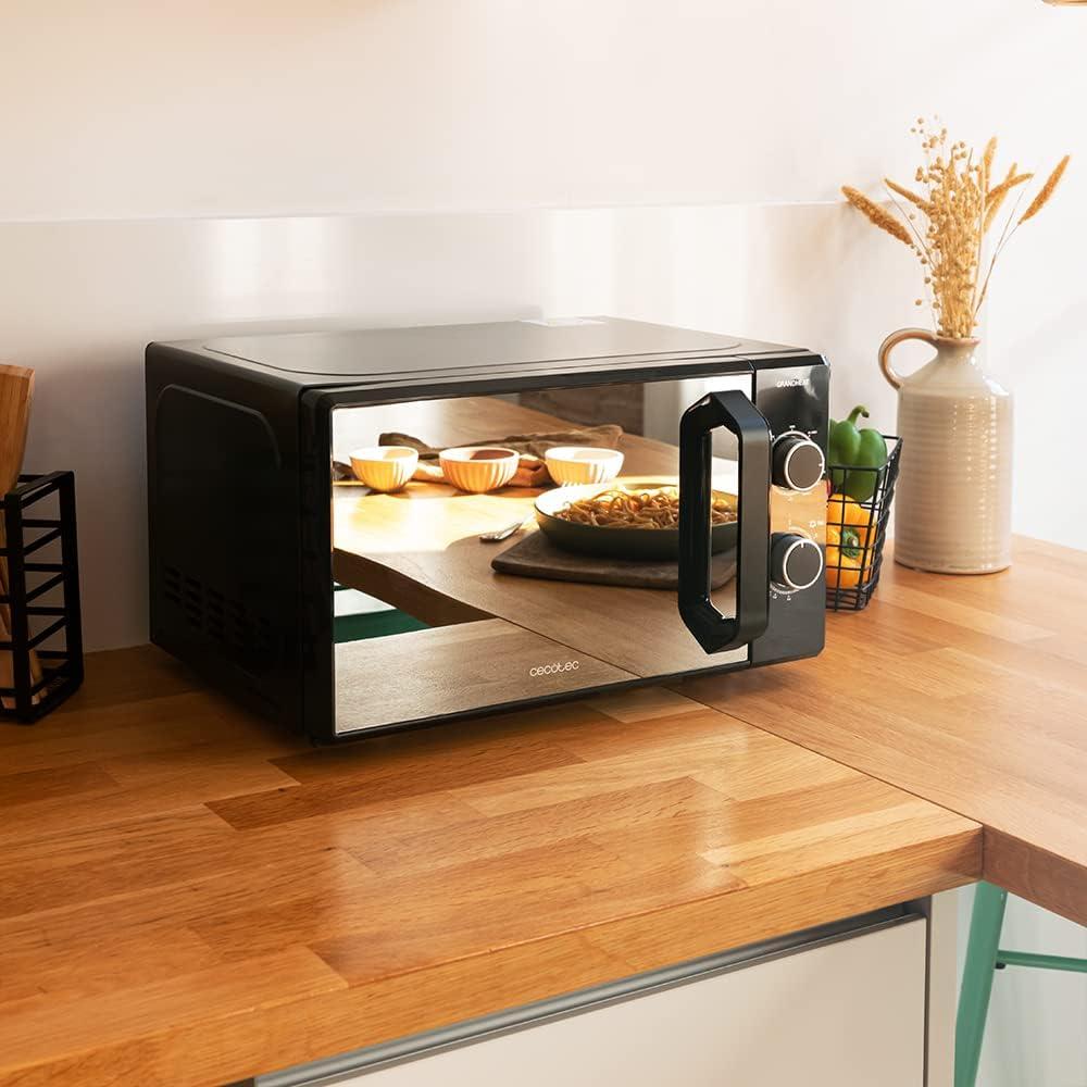 imageCecotec Microondes ProClean 3050 Capacit de 20 L Revtement Ready2Clean 700 W de Puissance 6 Niveaux de Fonctionnement Minuterie 30 minutes Mode Dcongeler Finition Noir et ArgentNoir avec Miroir Grill