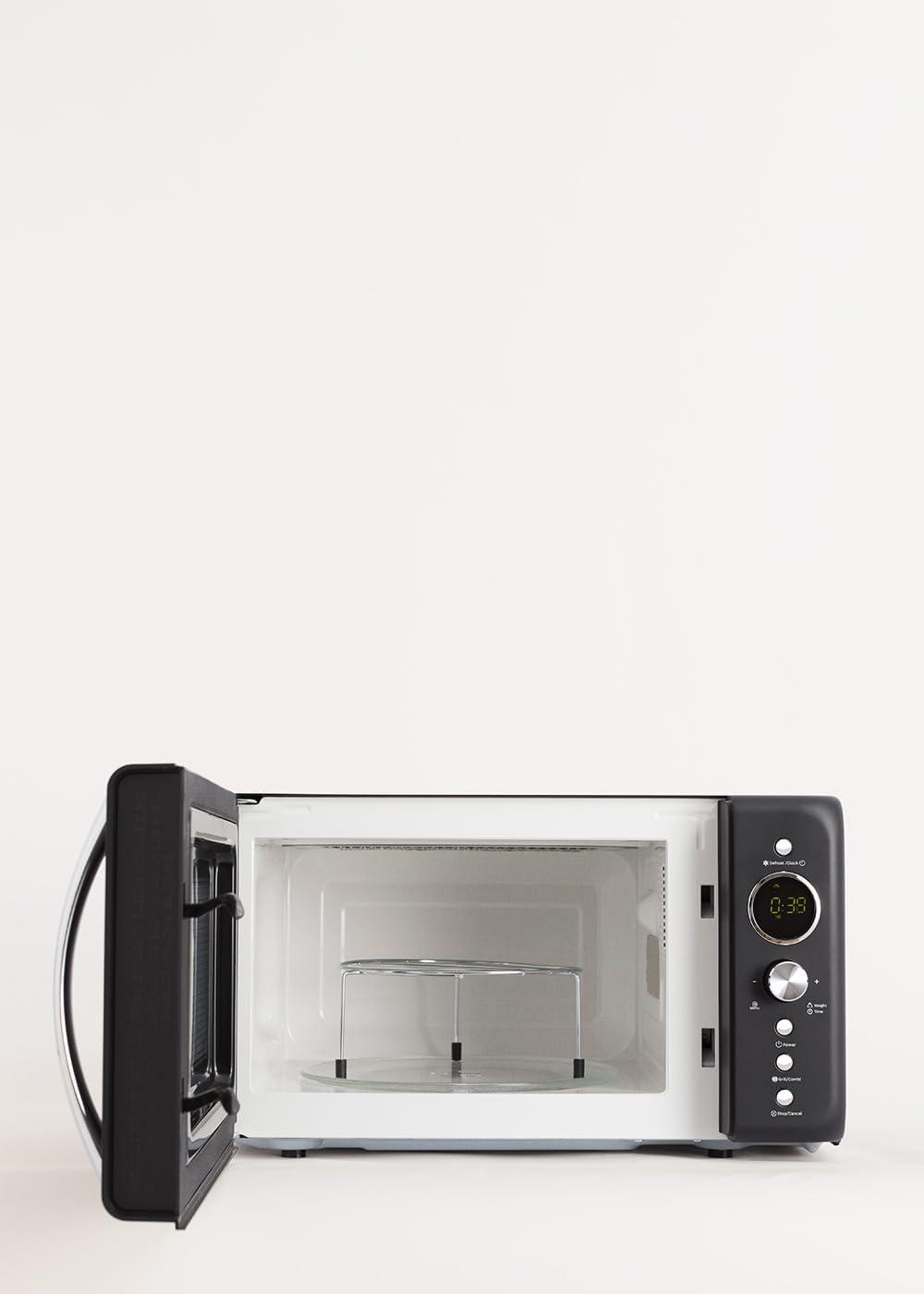 image:imageCREATEMICROWAVE STUDIOMicroondes avec fonction grill et four blanc cassCapacit 23L plateau 285 mm 10 niveaux de puissance 8 programmes automatiques 3 modes grill cran LED 1000WNoir