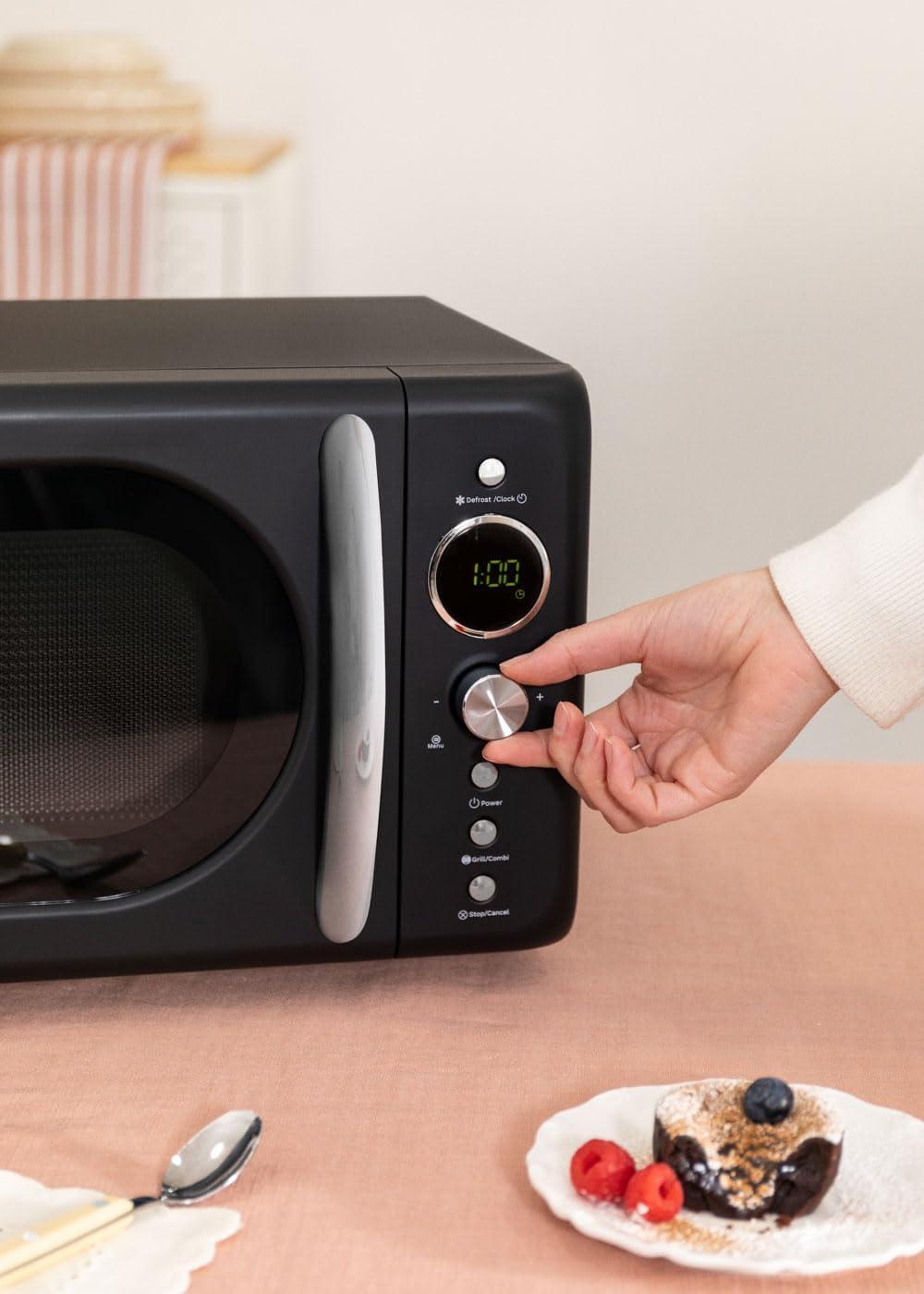 image:imageCREATEMICROWAVE STUDIOMicroondes avec fonction grill et four blanc cassCapacit 23L plateau 285 mm 10 niveaux de puissance 8 programmes automatiques 3 modes grill cran LED 1000WNoir