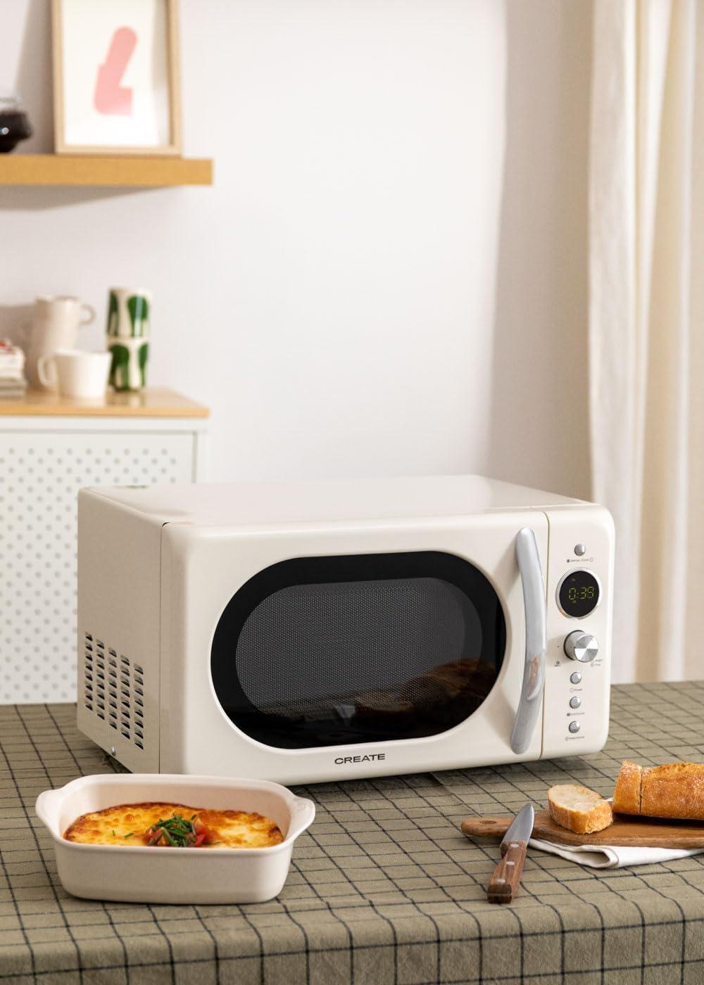 image:imageCREATEMICROWAVE STUDIOMicroondes avec fonction grill et four blanc cassCapacit 23L plateau 285 mm 10 niveaux de puissance 8 programmes automatiques 3 modes grill cran LED 1000WBlanc Cass