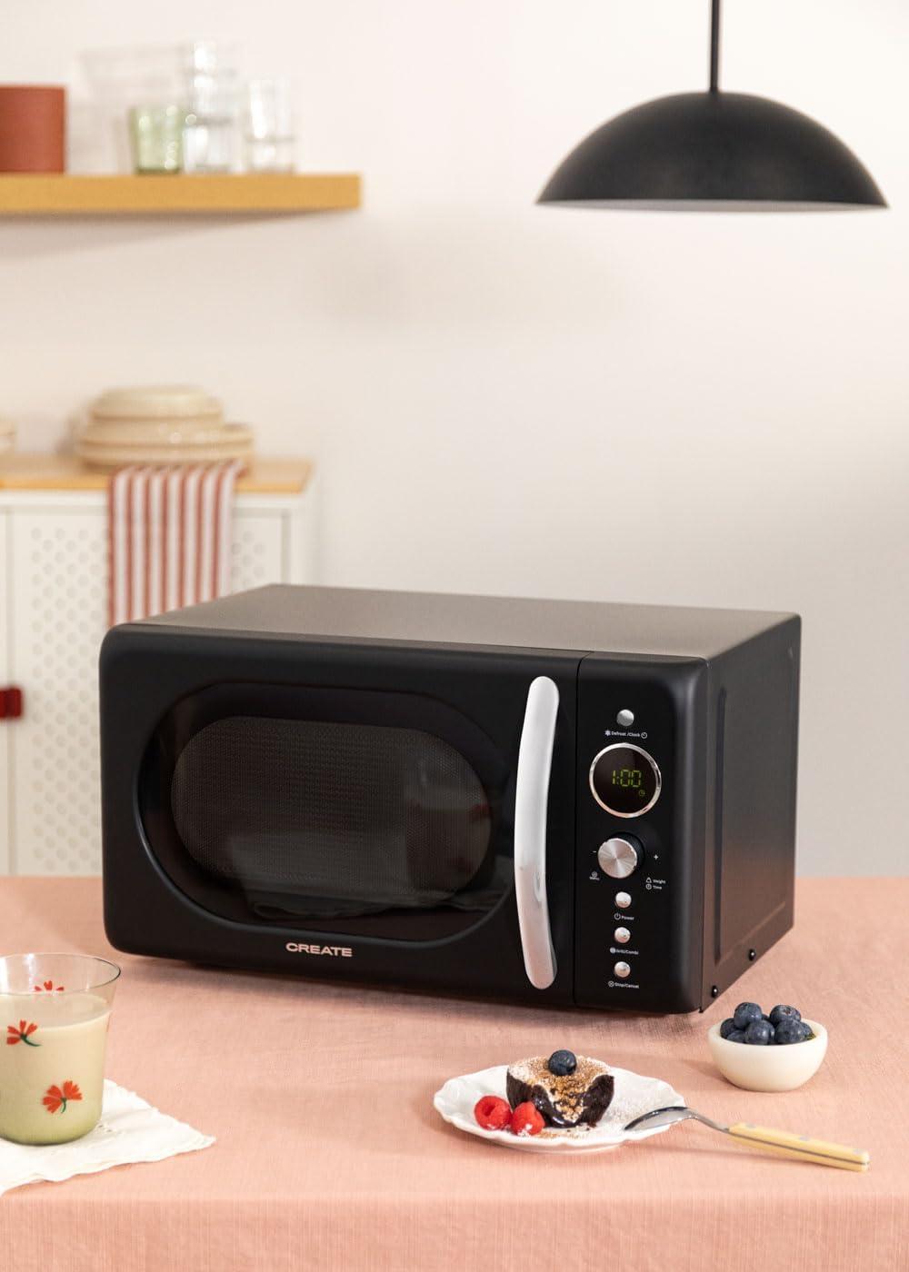 image:imageCREATEMICROWAVE STUDIOMicroondes avec fonction grill et four blanc cassCapacit 23L plateau 285 mm 10 niveaux de puissance 8 programmes automatiques 3 modes grill cran LED 1000WNoir