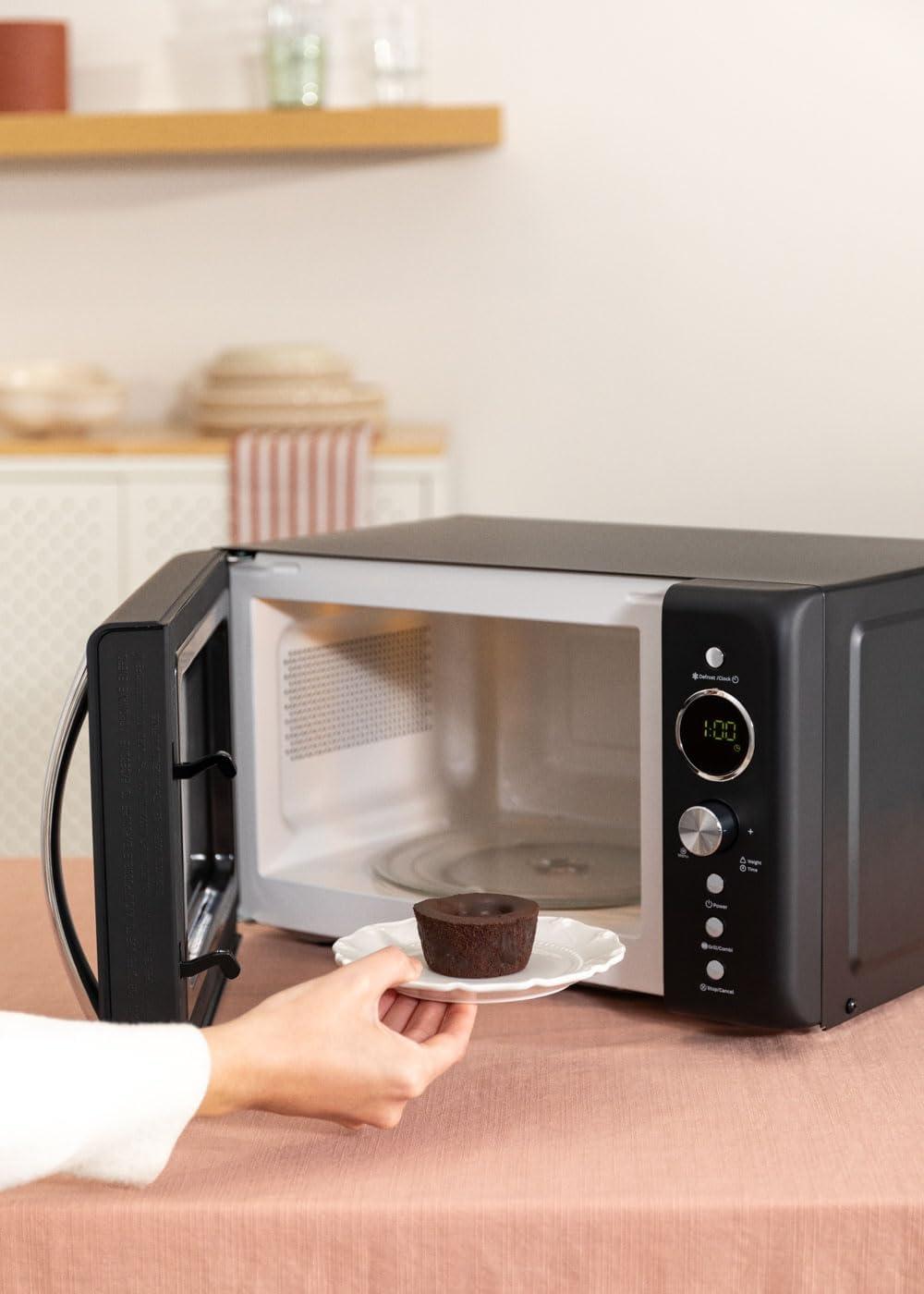 image:imageCREATEMICROWAVE STUDIOMicroondes avec fonction grill et four blanc cassCapacit 23L plateau 285 mm 10 niveaux de puissance 8 programmes automatiques 3 modes grill cran LED 1000WNoir