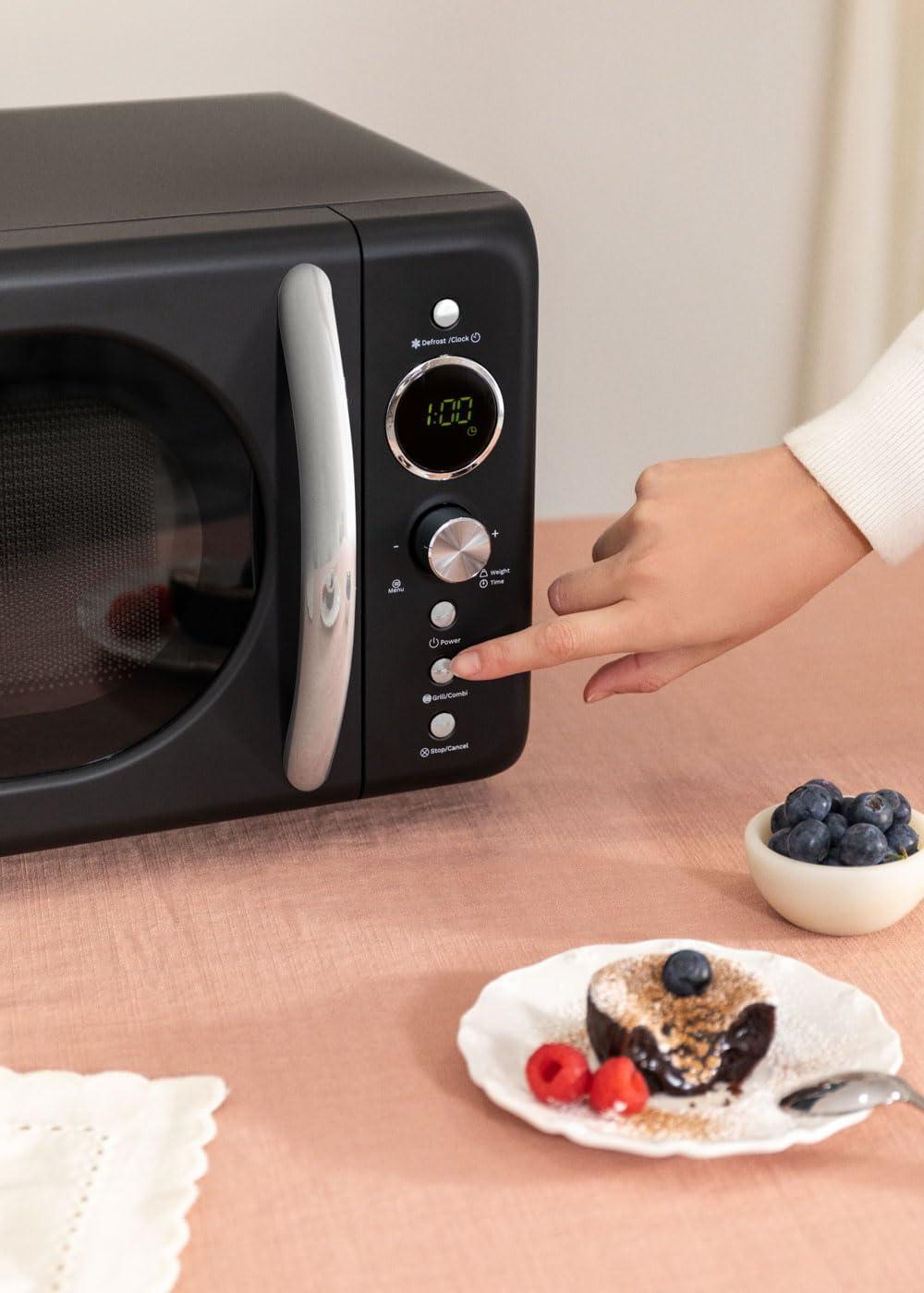 image:imageCREATEMICROWAVE STUDIOMicroondes avec fonction grill et four blanc cassCapacit 23L plateau 285 mm 10 niveaux de puissance 8 programmes automatiques 3 modes grill cran LED 1000WNoir