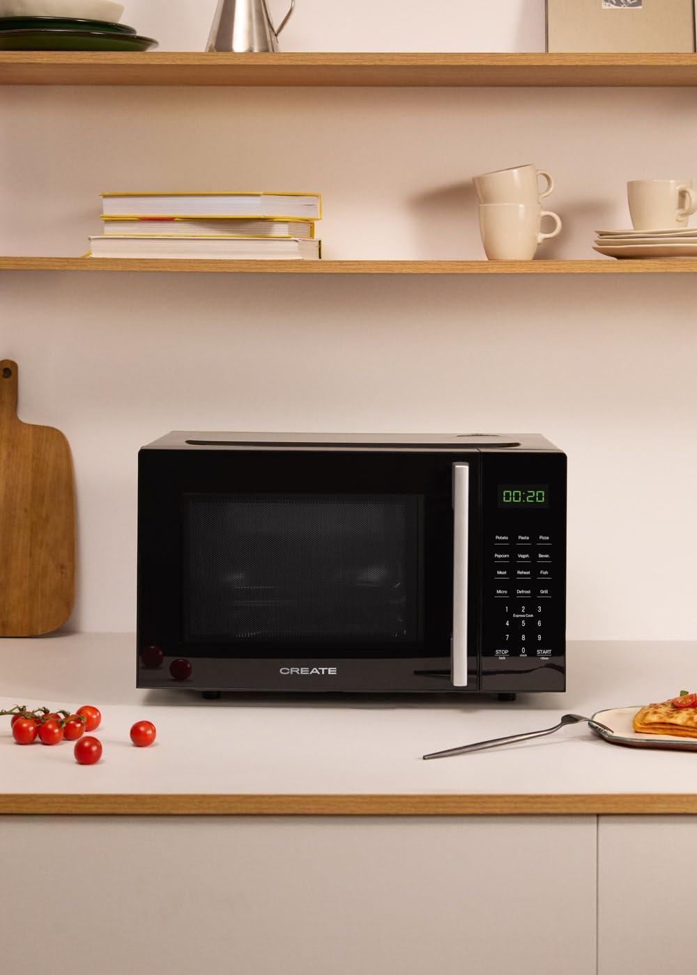image:imageCREATEMICROWAVE STUDIOMicroondes avec fonction grill et four blanc cassCapacit 23L plateau 285 mm 10 niveaux de puissance 8 programmes automatiques 3 modes grill cran LED 1000WNoir