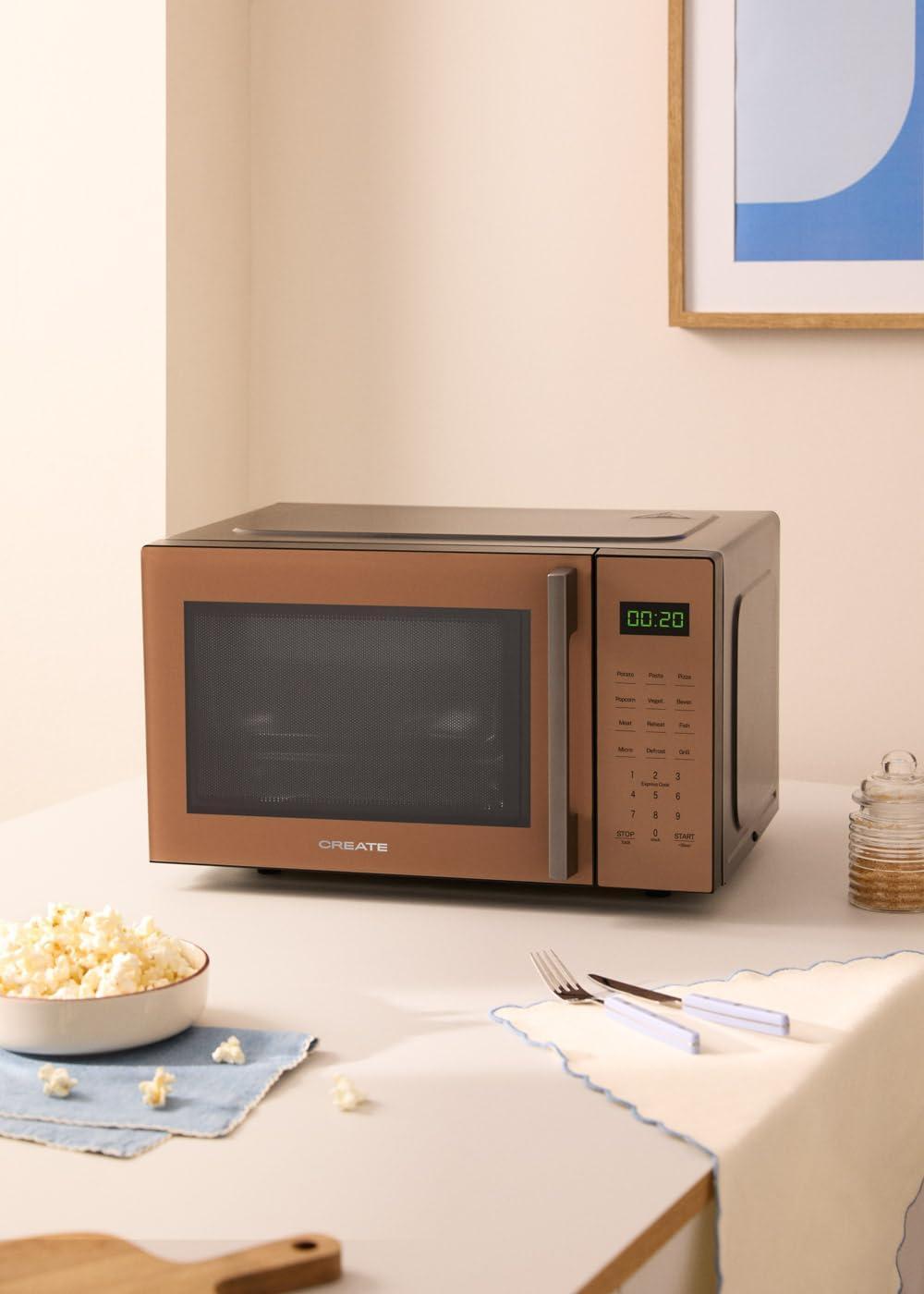 image:imageCREATEMICROWAVE STUDIOMicroondes avec fonction grill et four blanc cassCapacit 23L plateau 285 mm 10 niveaux de puissance 8 programmes automatiques 3 modes grill cran LED 1000WMoka