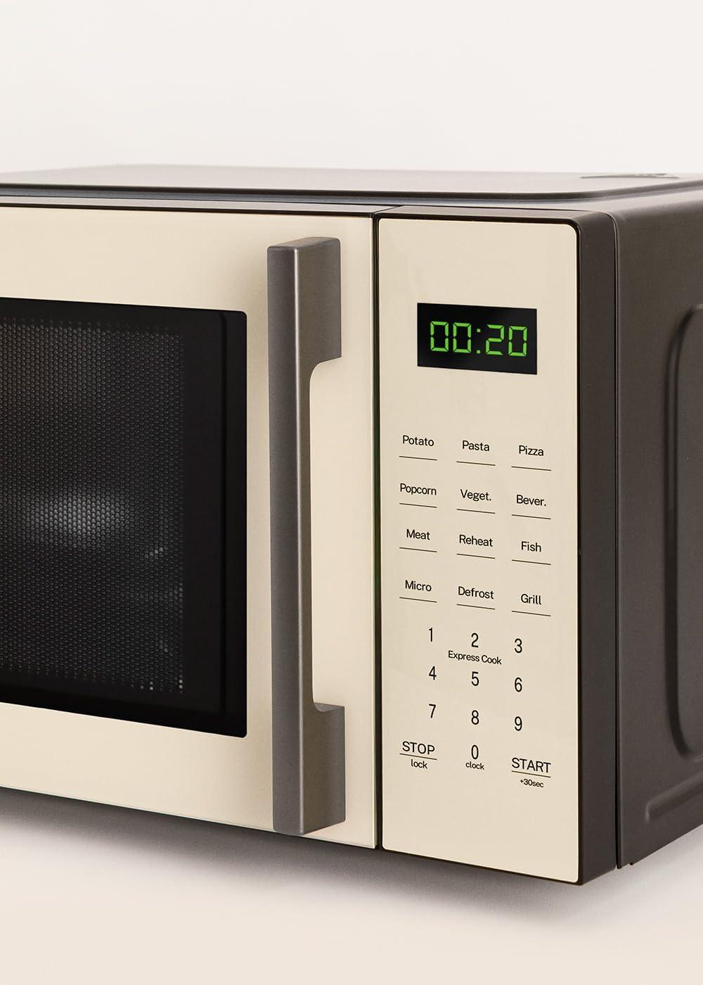 image:imageCREATEMICROWAVE STUDIOMicroondes avec fonction grill et four blanc cassCapacit 23L plateau 285 mm 10 niveaux de puissance 8 programmes automatiques 3 modes grill cran LED 1000WBlanc Cass