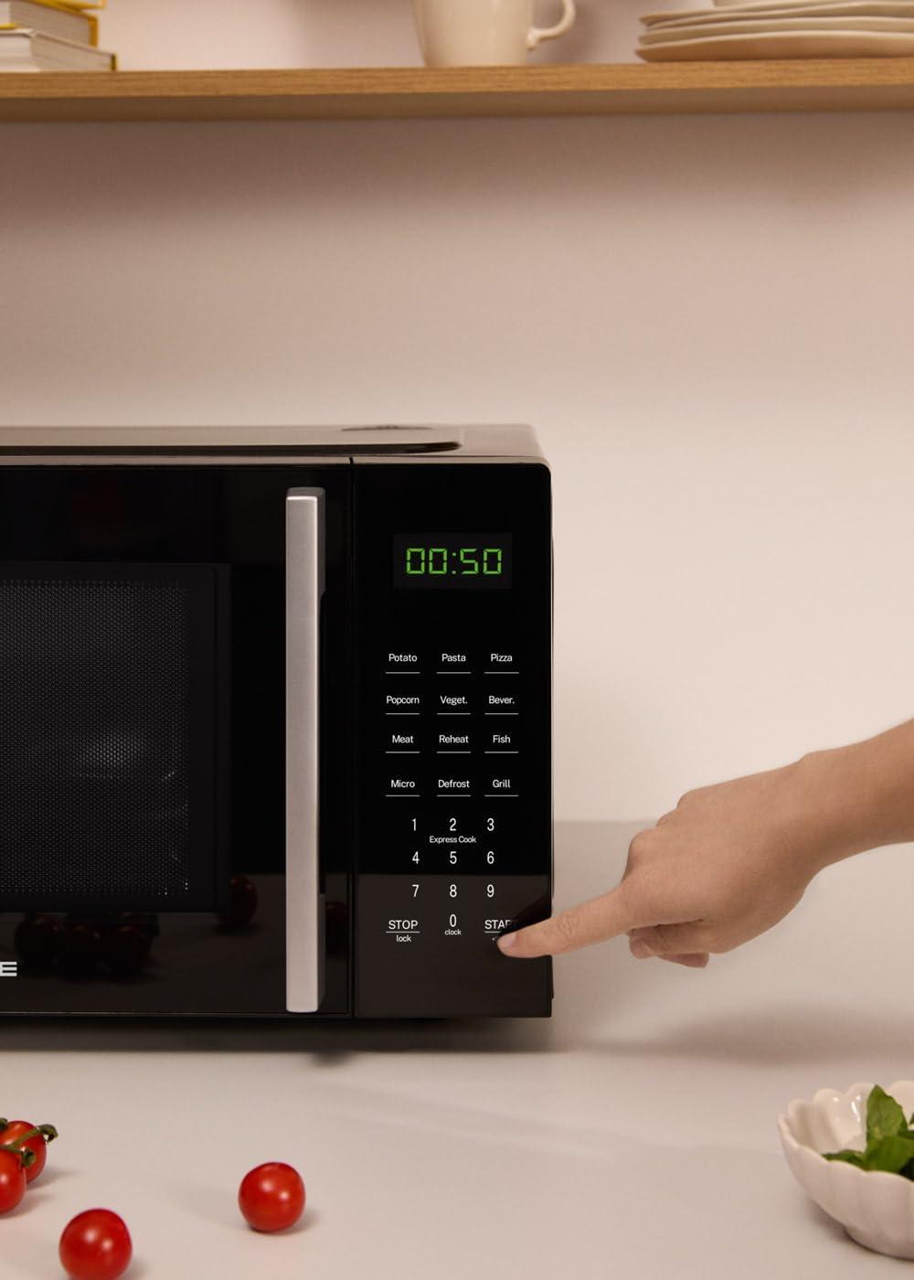 image:imageCREATEMICROWAVE STUDIOMicroondes avec fonction grill et four blanc cassCapacit 23L plateau 285 mm 10 niveaux de puissance 8 programmes automatiques 3 modes grill cran LED 1000WNoir