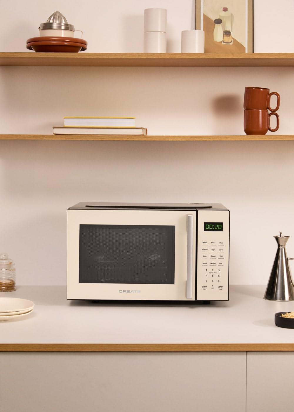 image:imageCREATEMICROWAVE STUDIOMicroondes avec fonction grill et four blanc cassCapacit 23L plateau 285 mm 10 niveaux de puissance 8 programmes automatiques 3 modes grill cran LED 1000WBlanc Cass